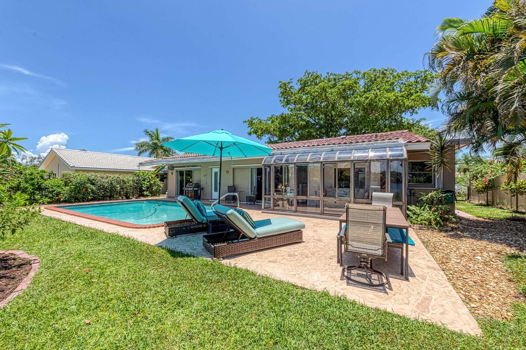 1055 Southwest 11th Street Boca Raton, FL 33486 - Photo 25 of 26 pool patio