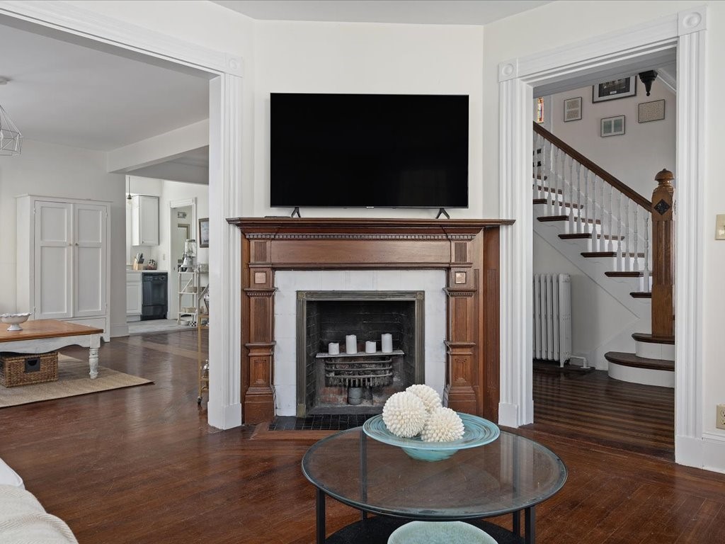 43 Howard Street Newport, RI 02840 - Photo 11 of 29 Living room fireplace