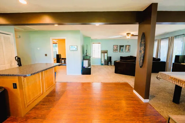 a large spacious bathroom with a large tub and sink