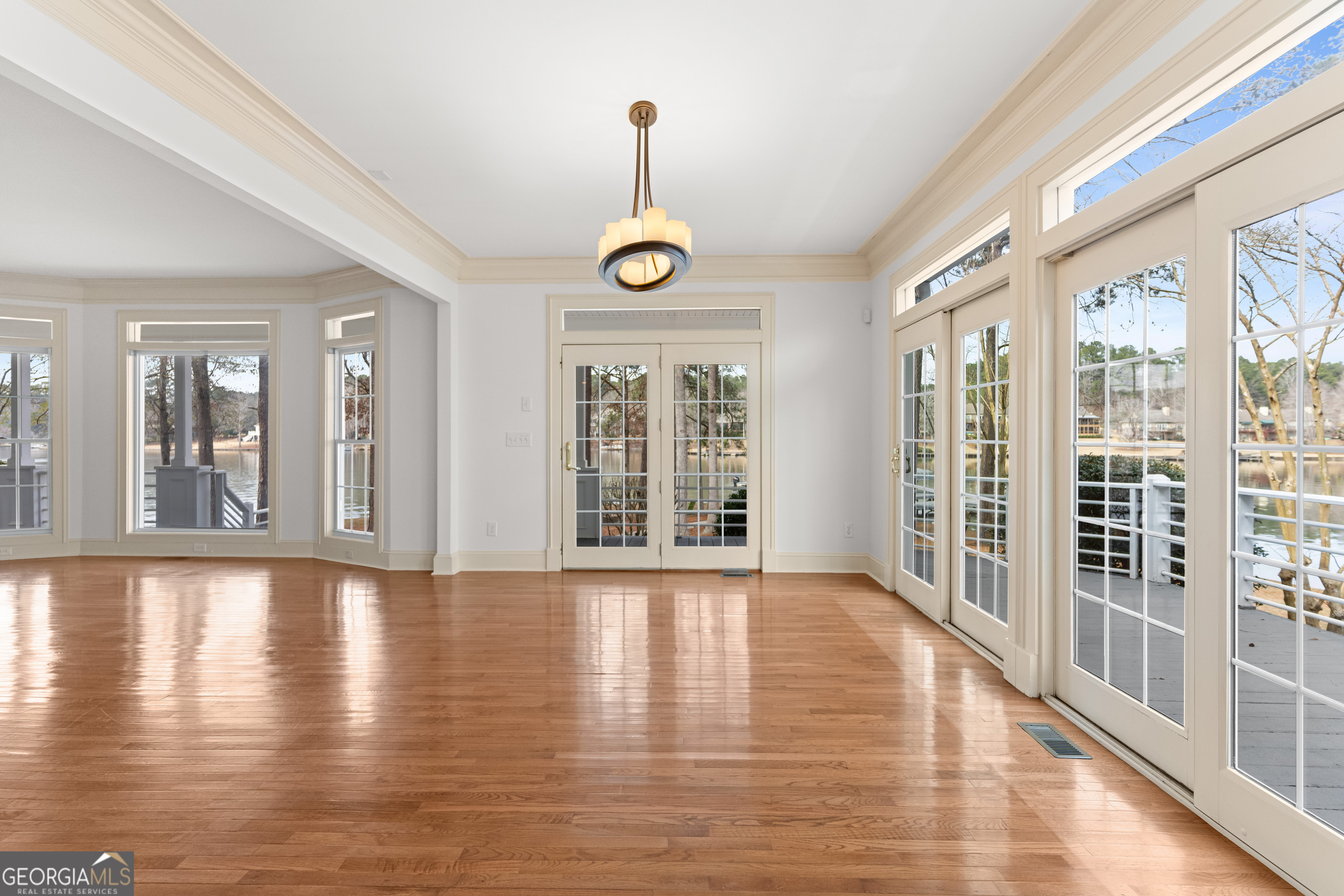 1010 Plum Orchard Road Greensboro, GA 30642 - Photo 30 of 85 a view of an entryway with wooden floor and windows