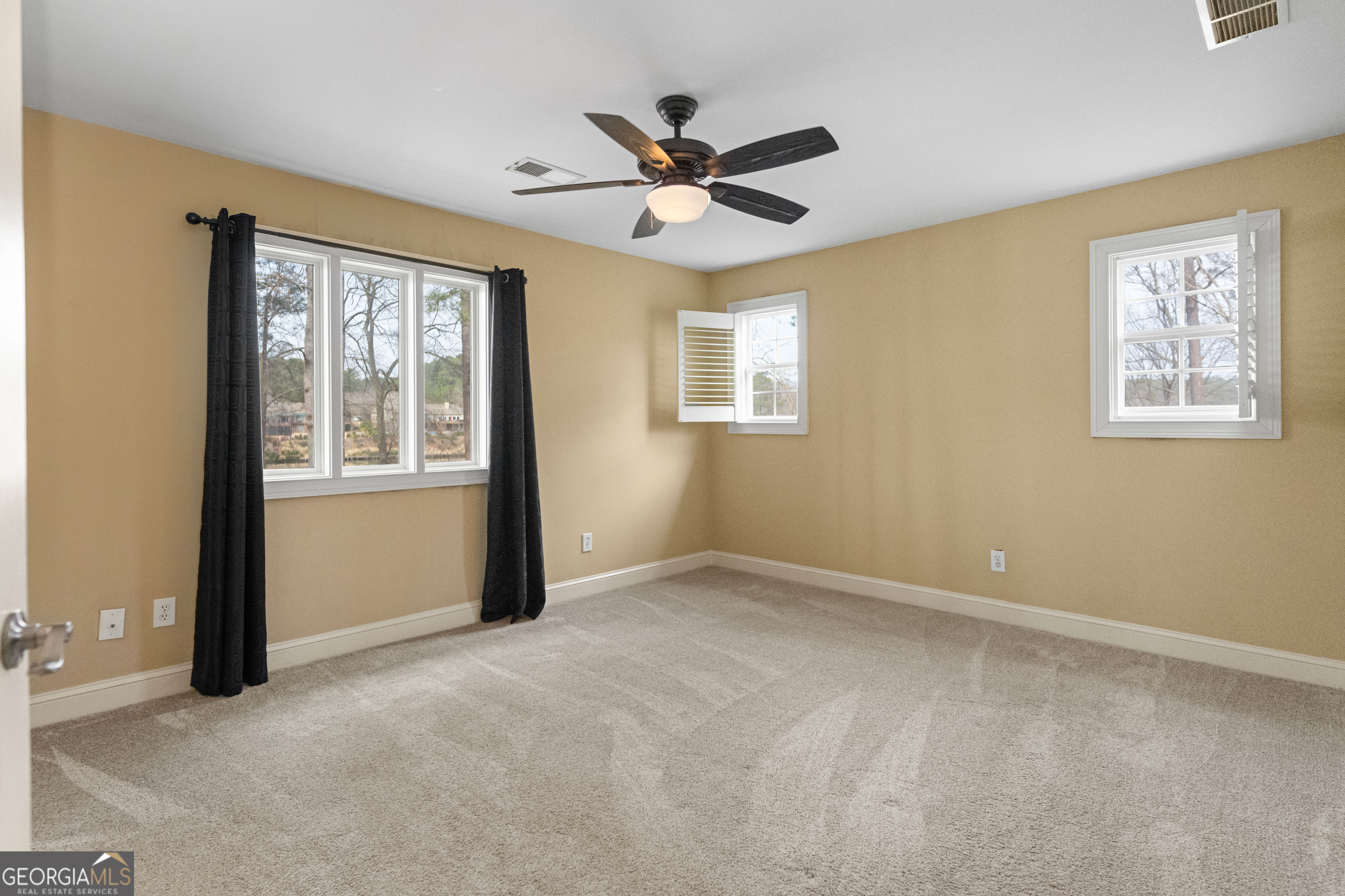 1010 Plum Orchard Road Greensboro, GA 30642 - Photo 43 of 85 a view of an empty room with a window