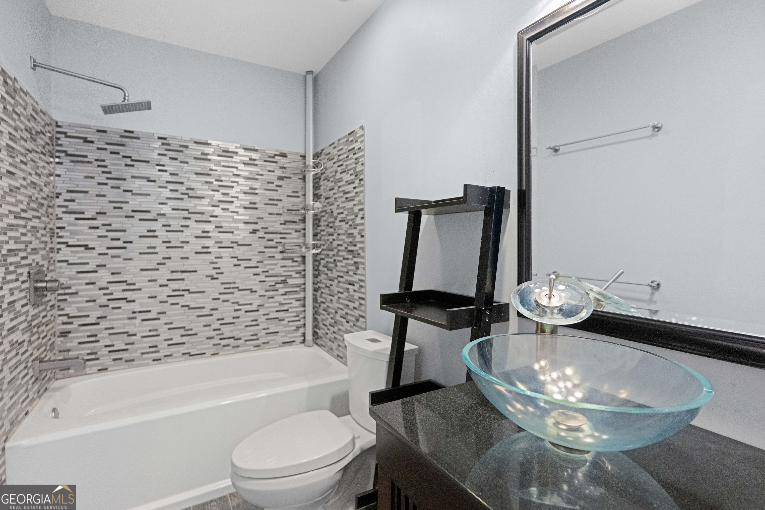 1010 Plum Orchard Road Greensboro, GA 30642 - Photo 44 of 85 a bathroom with a sink a toilet and bathtub