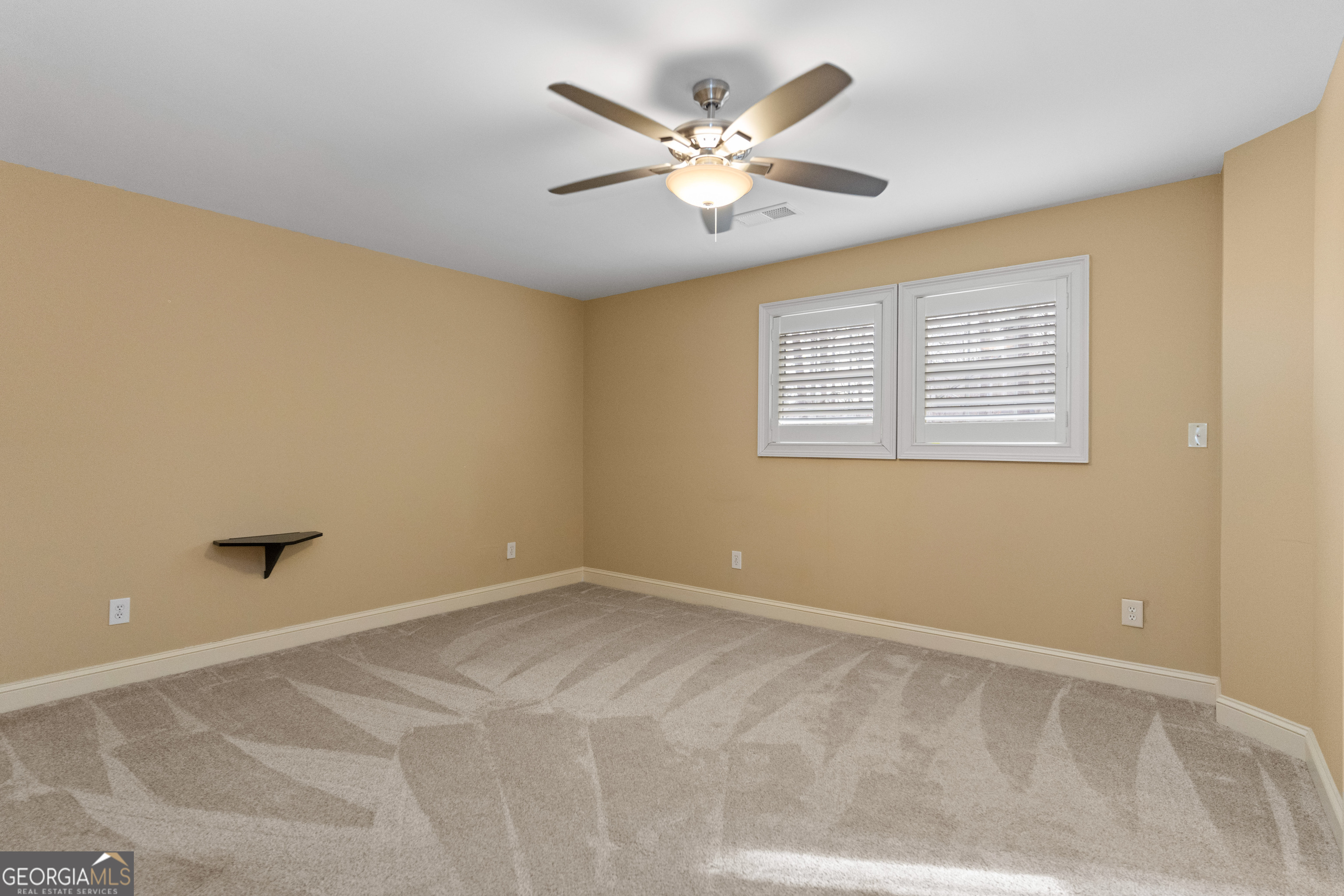 1010 Plum Orchard Road Greensboro, GA 30642 - Photo 45 of 85 a view of an empty room with a window