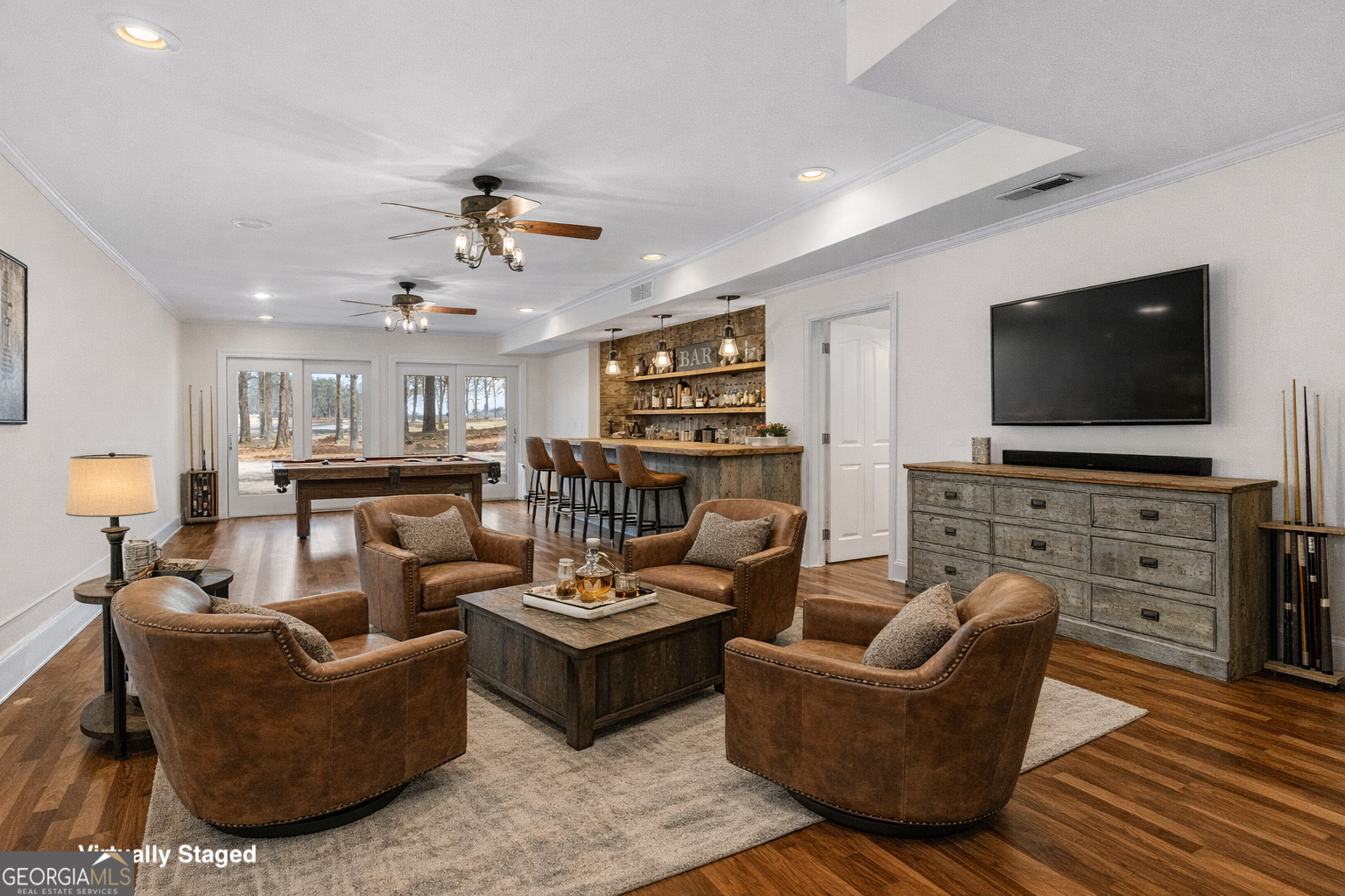 1010 Plum Orchard Road Greensboro, GA 30642 - Photo 50 of 85 a living room with furniture and a flat screen tv