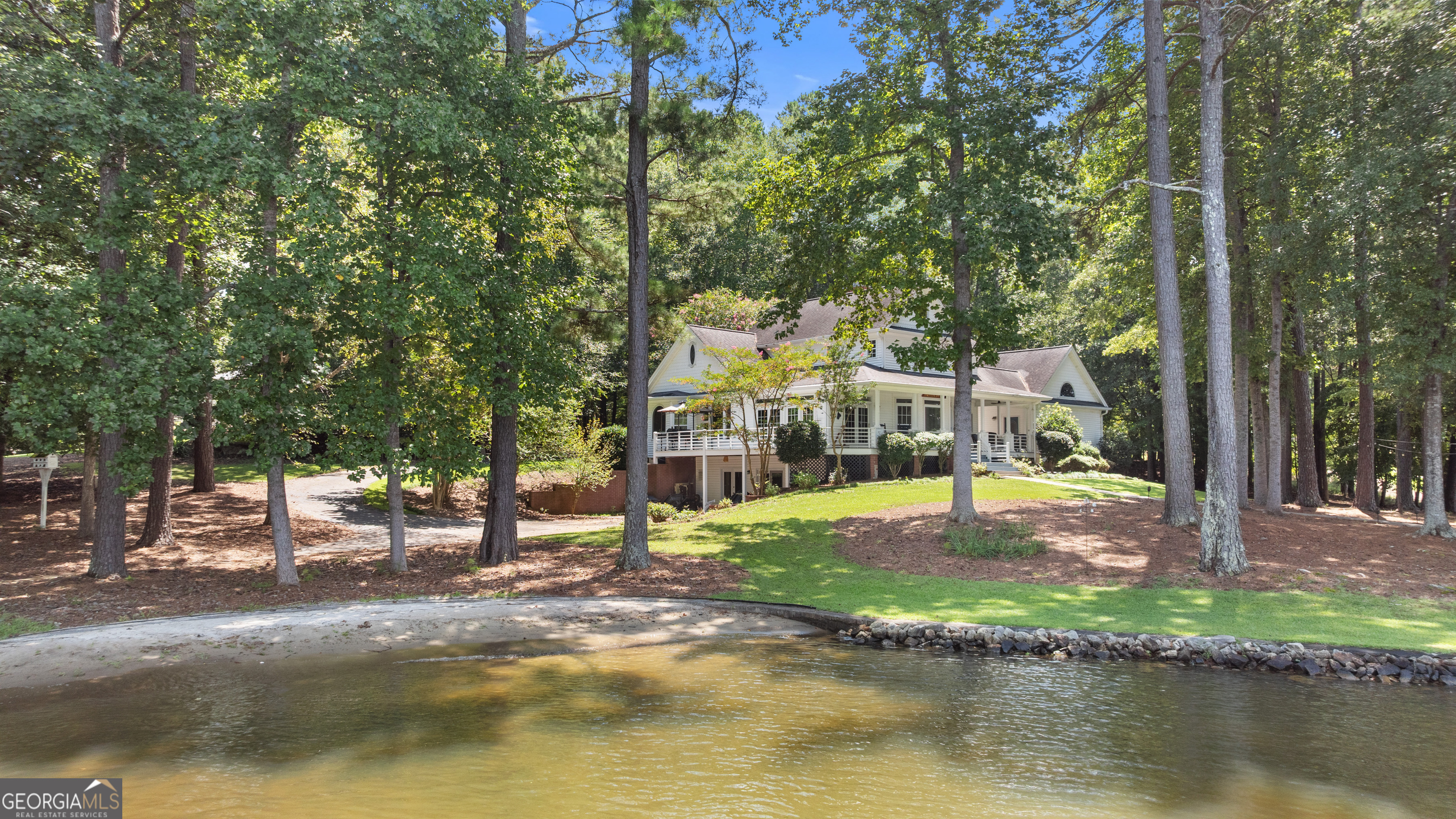 1010 Plum Orchard Road Greensboro, GA 30642 - Photo 5 of 85 a view of a house with swimming pool and a yard