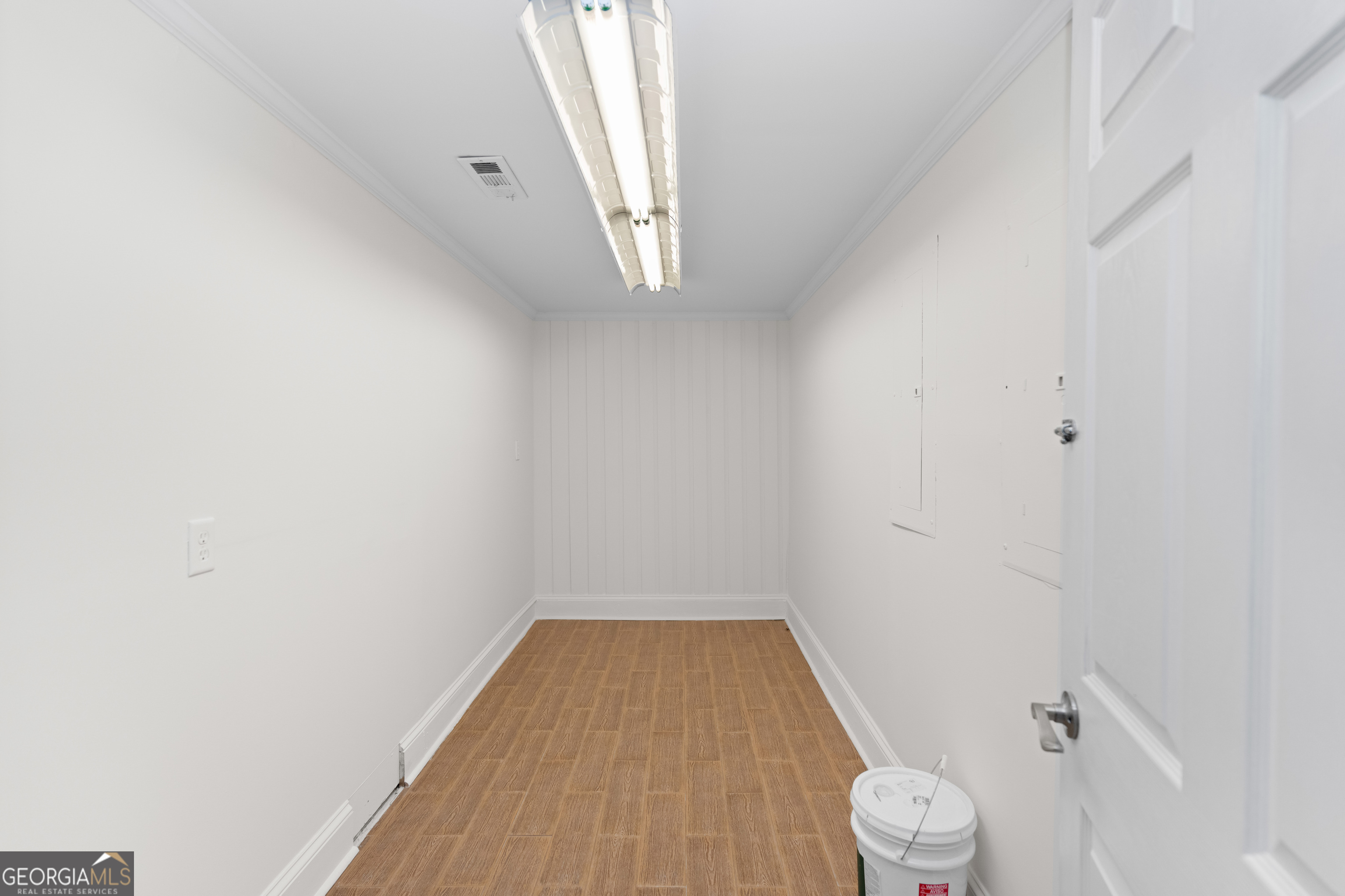 1010 Plum Orchard Road Greensboro, GA 30642 - Photo 54 of 85 a view of a bathroom with wooden floor