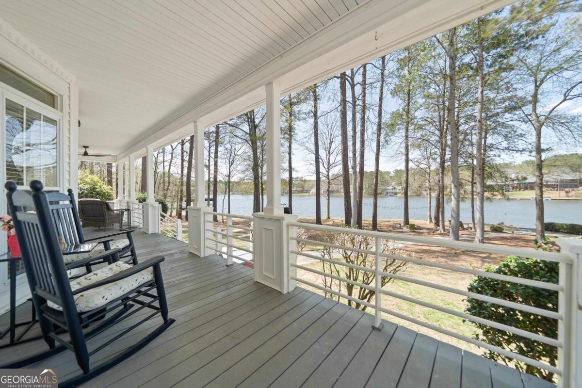 1010 Plum Orchard Road Greensboro, GA 30642 - Photo 63 of 85 a living room with furniture and large windows