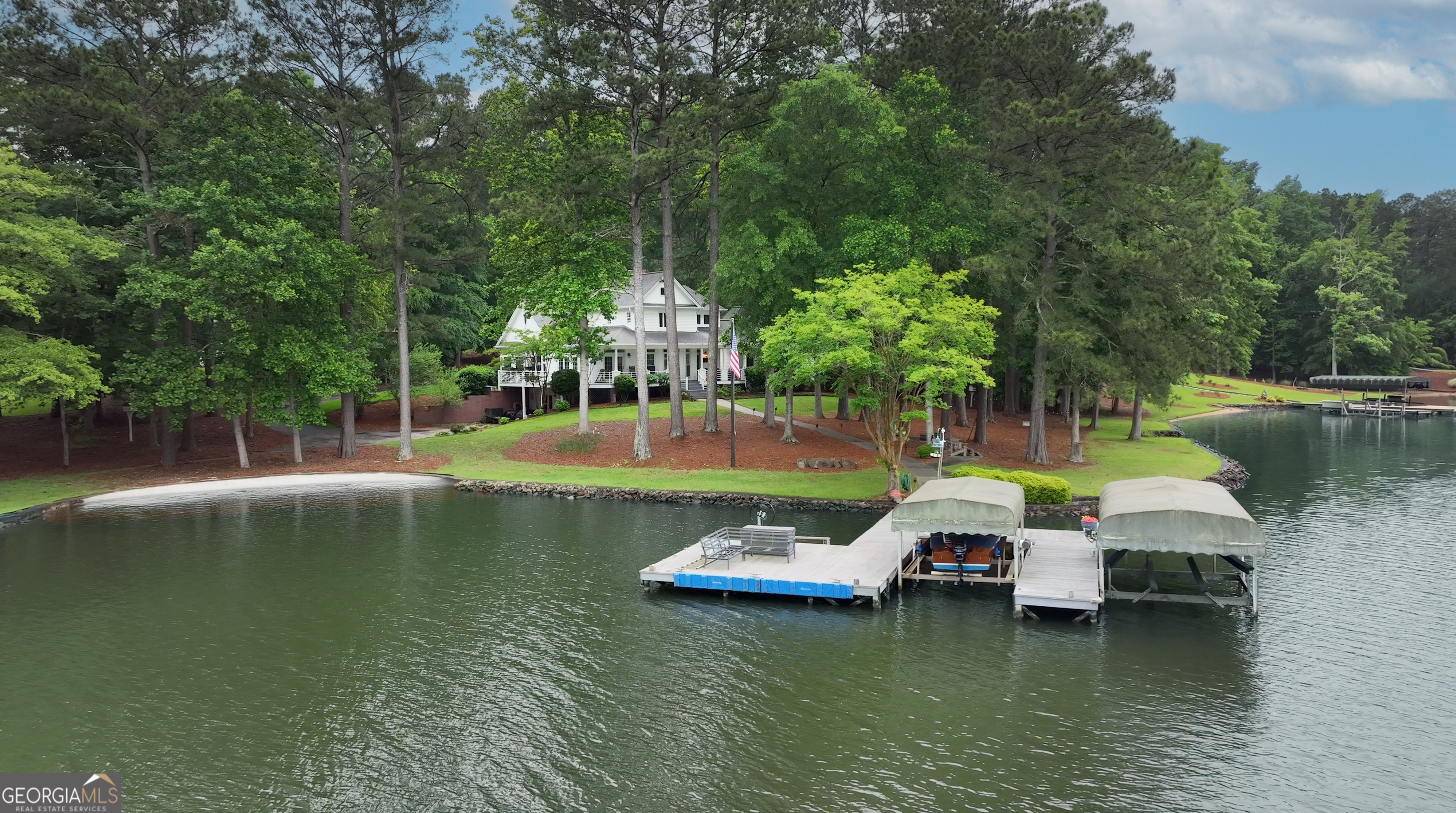 1010 Plum Orchard Road Greensboro, GA 30642 - Photo 66 of 85 a view of a lake with houses