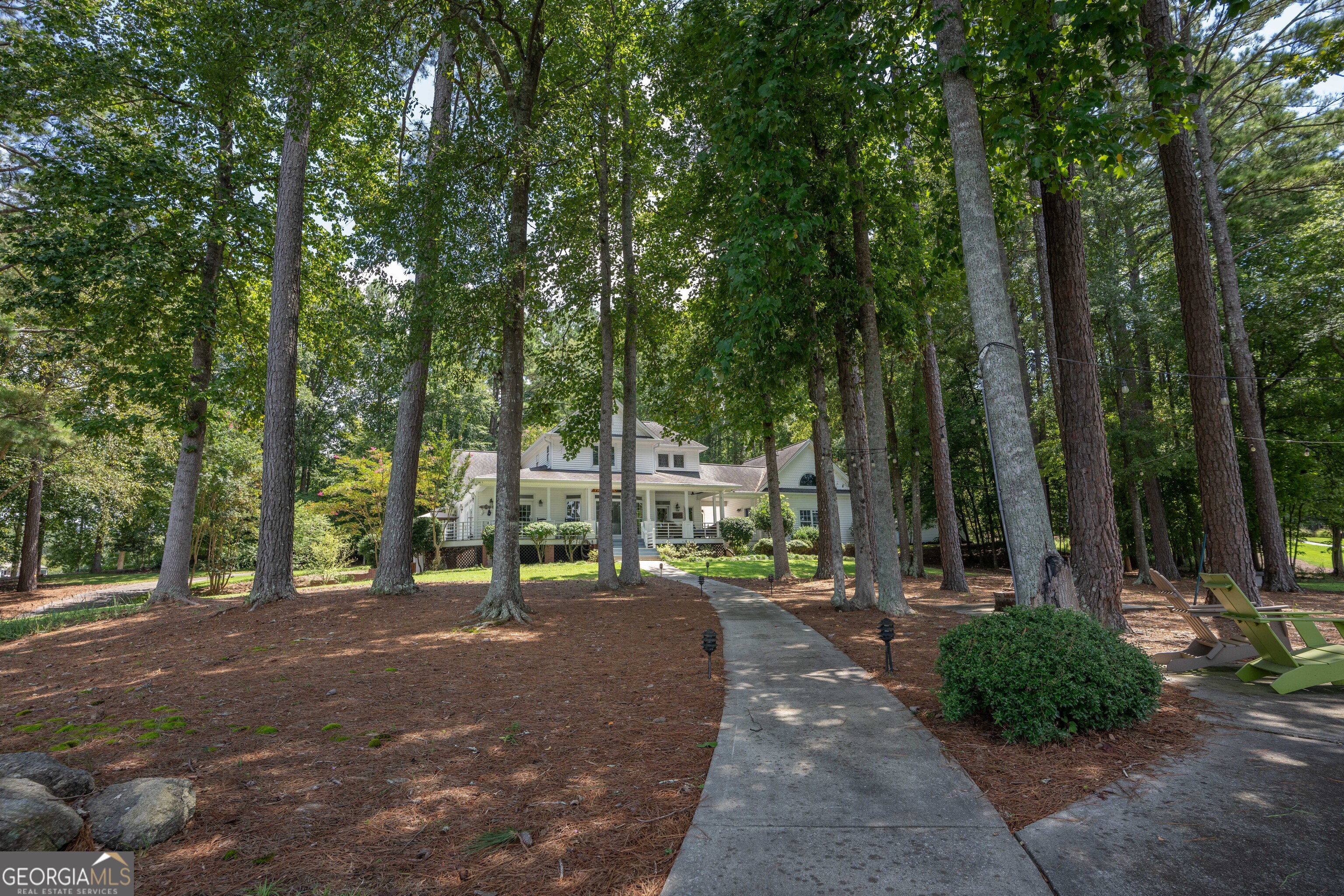 1010 Plum Orchard Road Greensboro, GA 30642 - Photo 71 of 85 a view of outdoor space with deck and trees