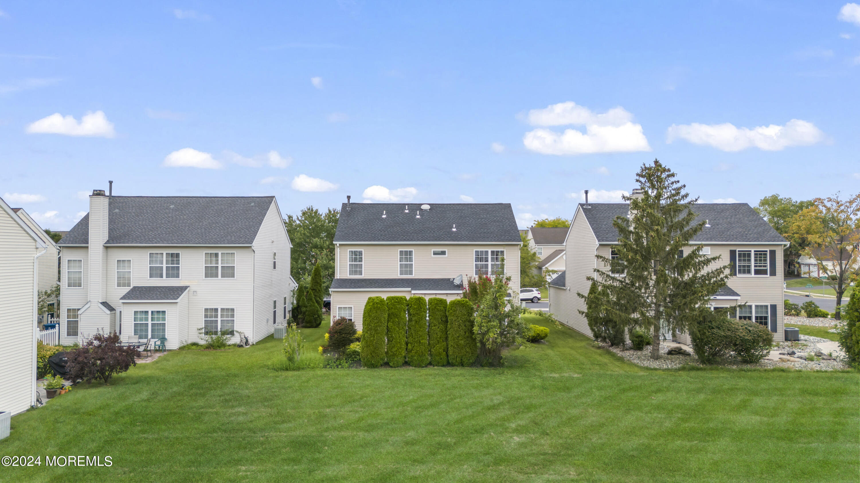25 Sandstone Road East Windsor, NJ 08520 - Photo 24 of 33 a view of a house with a backyard