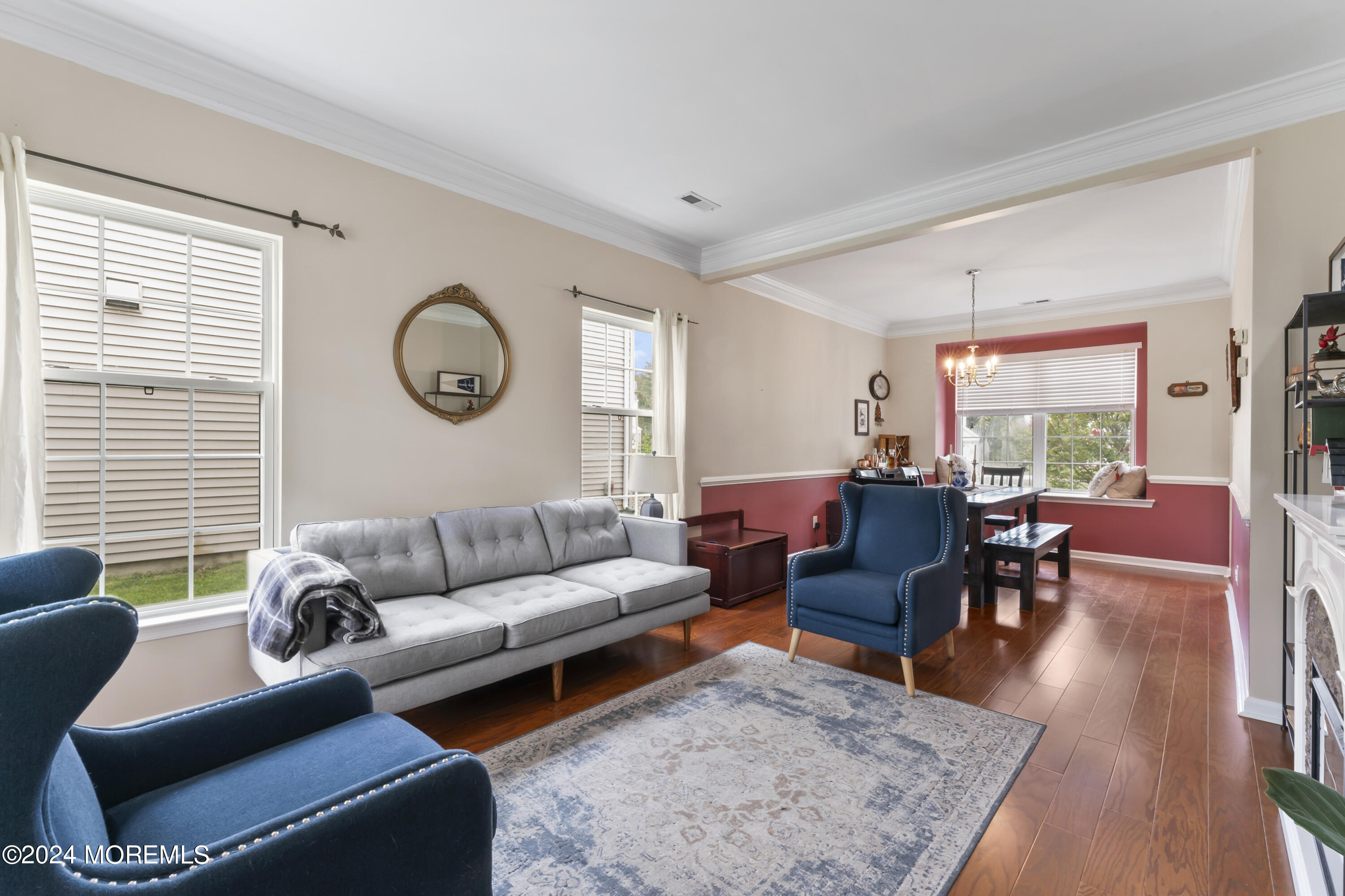 25 Sandstone Road East Windsor, NJ 08520 - Photo 4 of 33 a living room with furniture wooden floor and a large window