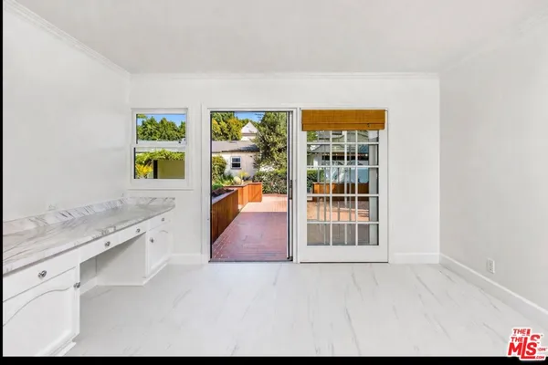 a view of swimming pool with a patio