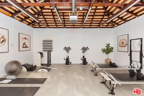 a view of a room with gym equipment