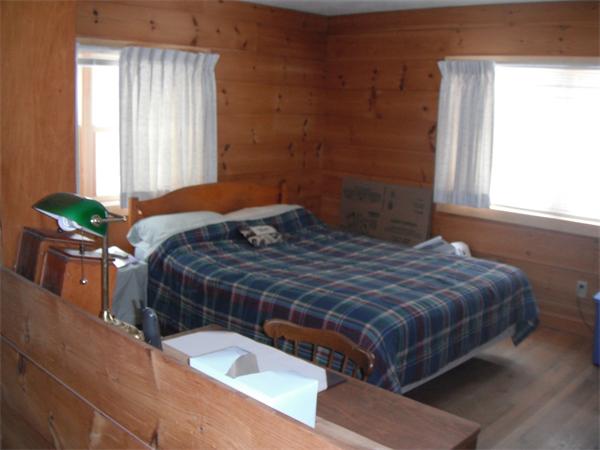 15 Groton-Shirley Road Ayer, MA 01432 - Photo 9 of 19 a bedroom with a bed and windows