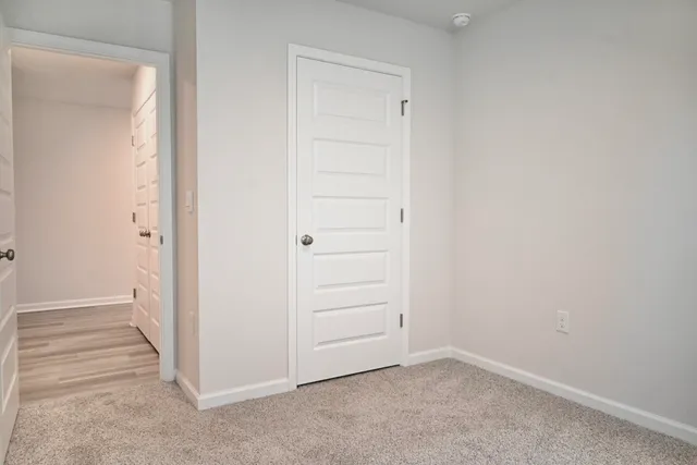 an empty room with window