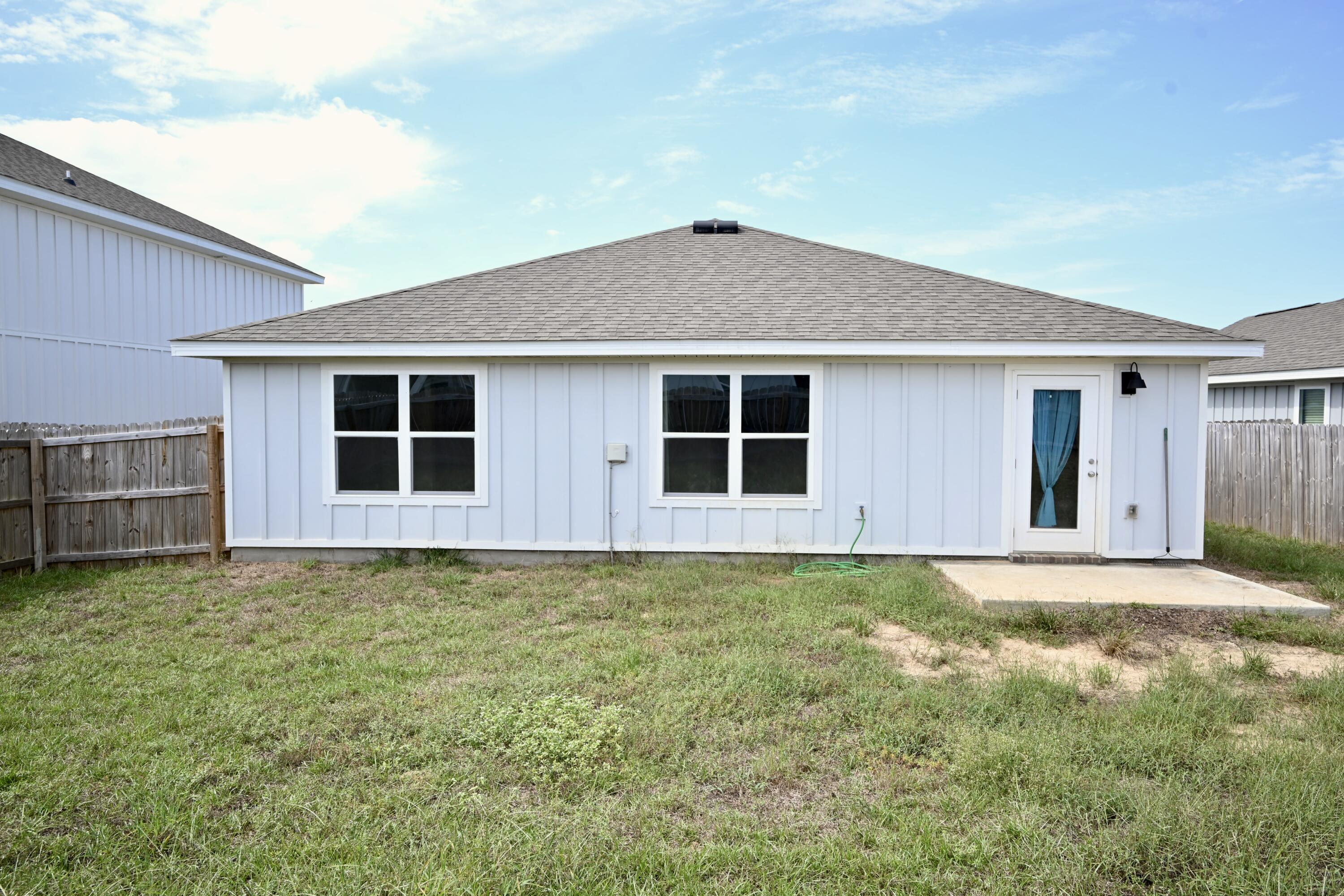429 Scarborough Street Crestview, FL 32539 - Photo 27 of 30 a view of a house with a yard