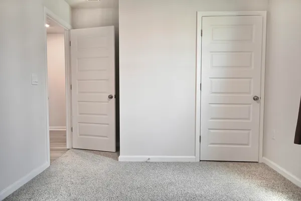 an empty room with closet