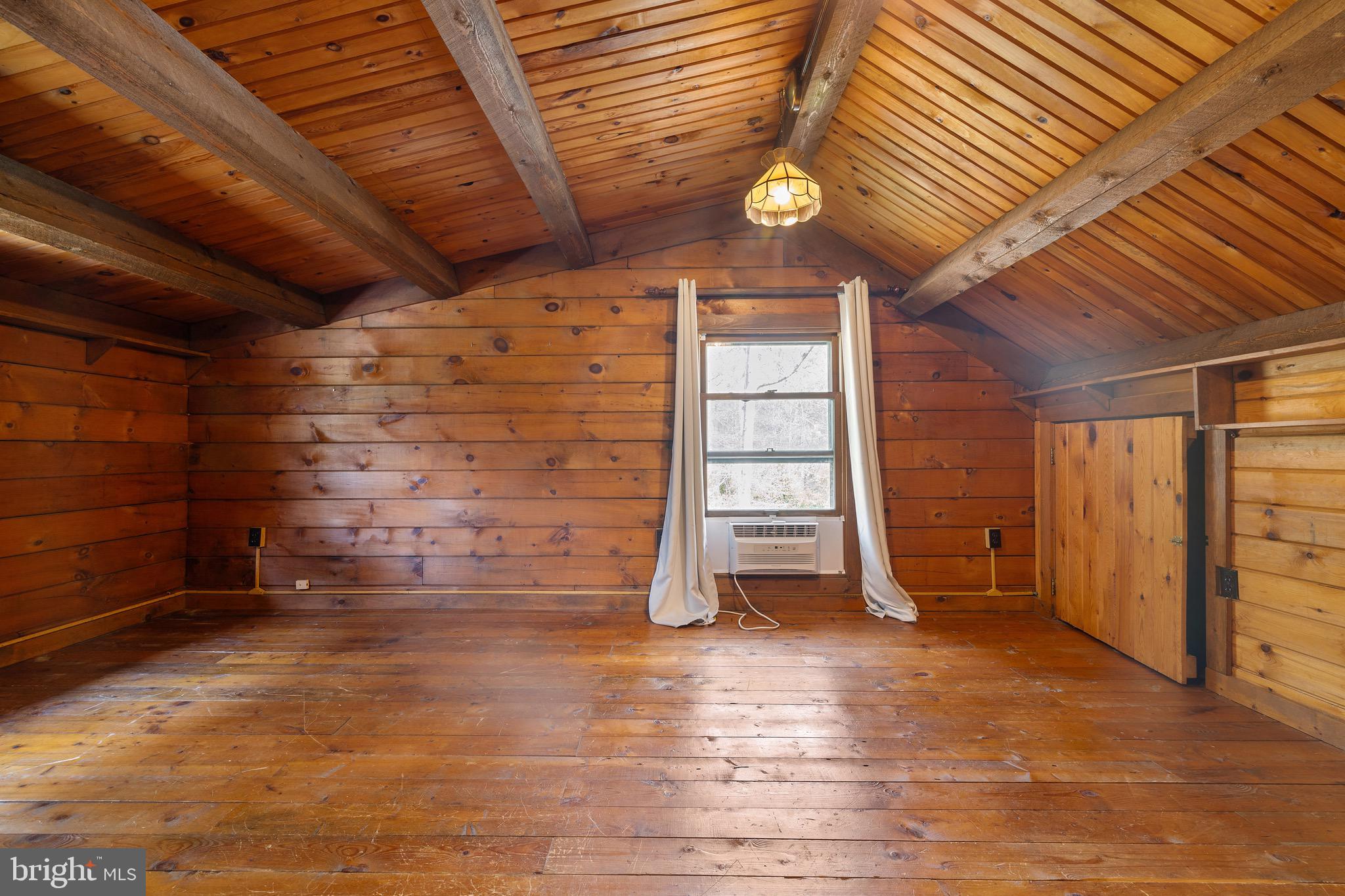6402 Otis Street Cheverly, MD 20785 - Photo 23 of 52 a view of empty room with wooden ceiling