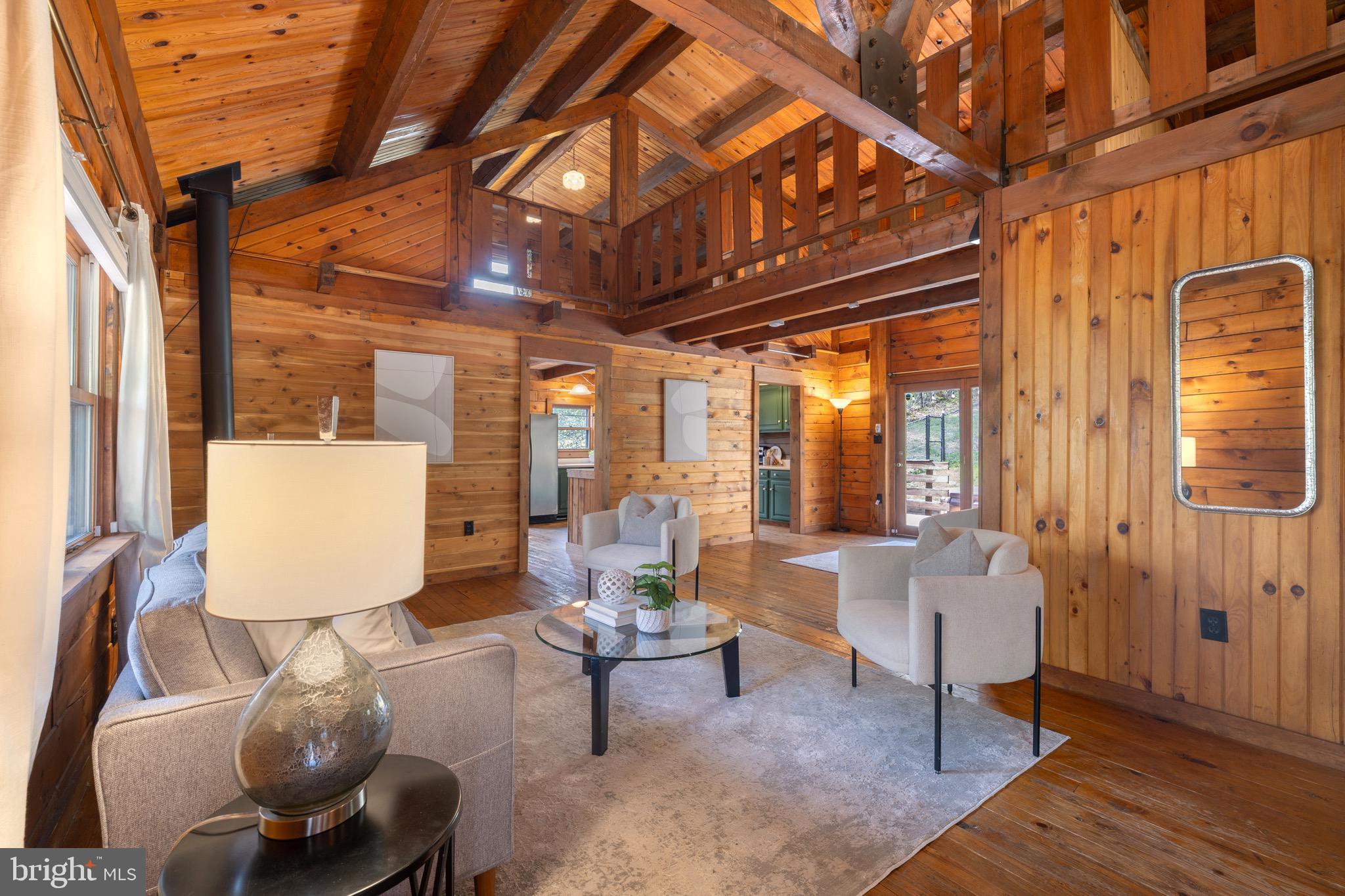6402 Otis Street Cheverly, MD 20785 - Photo 4 of 52 a living room with furniture and a large window