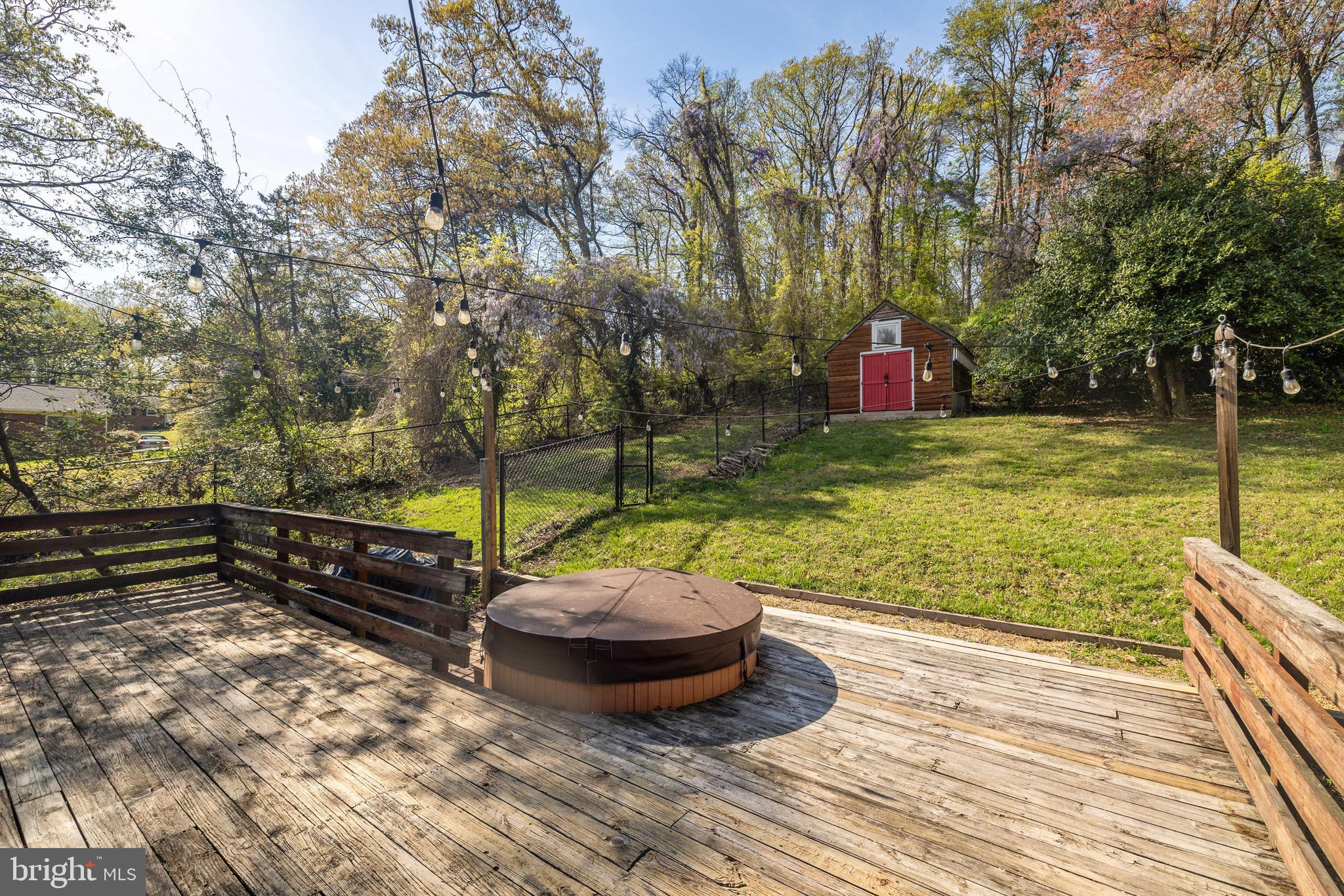 6402 Otis Street Cheverly, MD 20785 - Photo 46 of 52 a view of a swimming pool with a patio and a yard