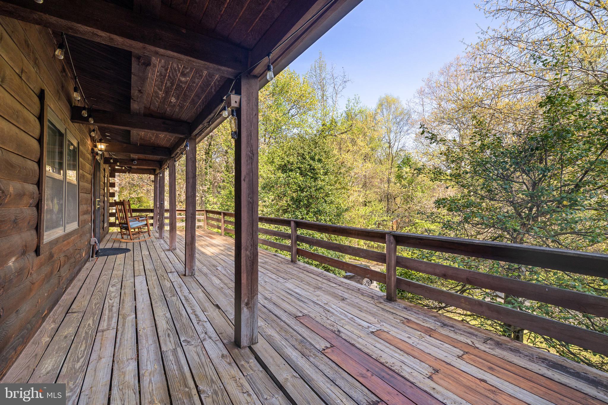 6402 Otis Street Cheverly, MD 20785 - Photo 49 of 52 a view of a balcony with wooden floor