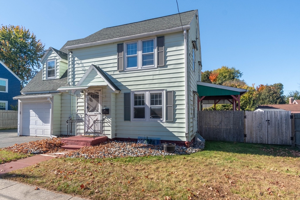 54 Ashbrook Street Springfield, MA 01118 - Photo 2 of 30 a front view of a house with a garden
