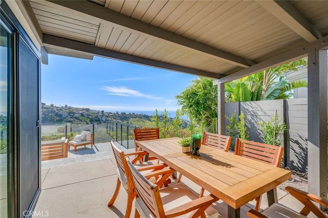 a view of an outdoor space with furniture