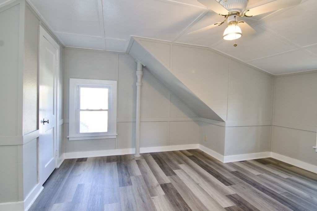71 Mayflower Road Springfield, MA 01118 - Photo 30 of 42 wooden floor in an empty room with a window