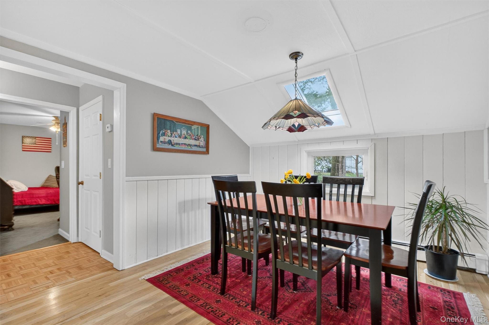 3 Camden Road Brewster, NY 10509 - Photo 22 of 39 a view of a dining room with furniture wooden floor and a chandelier