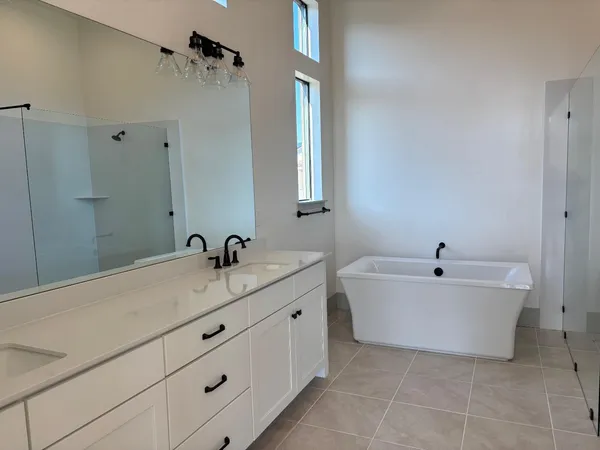 a bathroom with a shower and a toilet