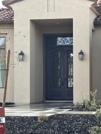 a bedroom with a bed and a table