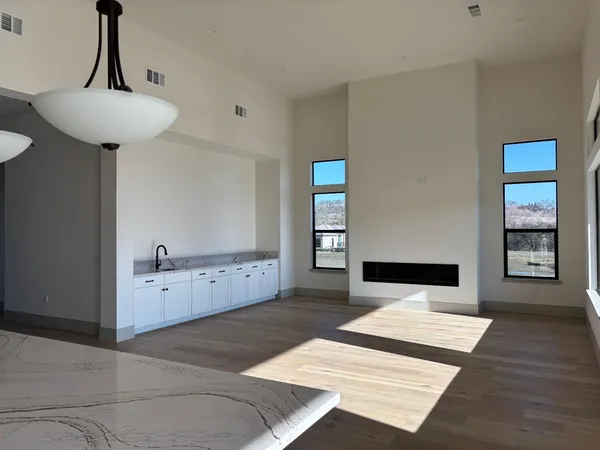 a kitchen with kitchen island a counter top space and appliances