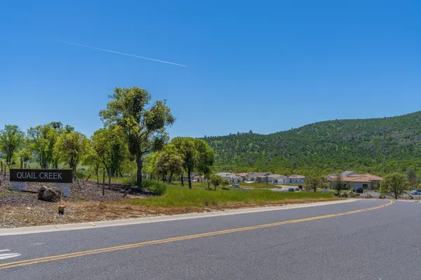a view of a city with mountains in the background