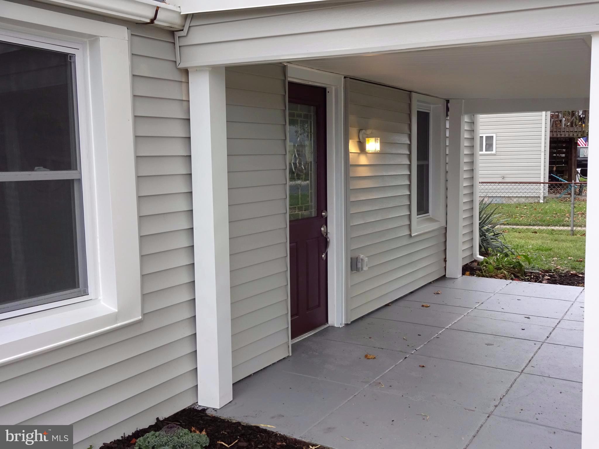 7800 Fairgreen Road Baltimore, MD 21222 - Photo 18 of 24 Covered Front Porch