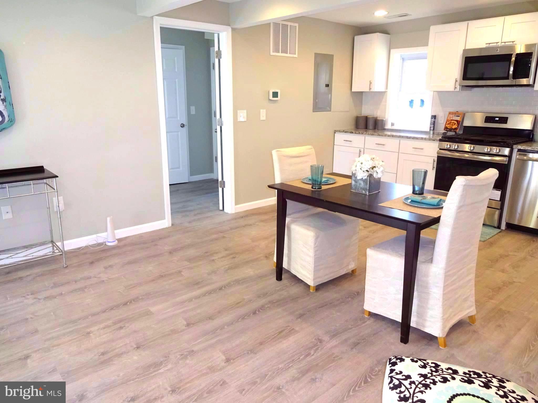 7800 Fairgreen Road Baltimore, MD 21222 - Photo 5 of 24 Dining Room w/ Cam Lighting