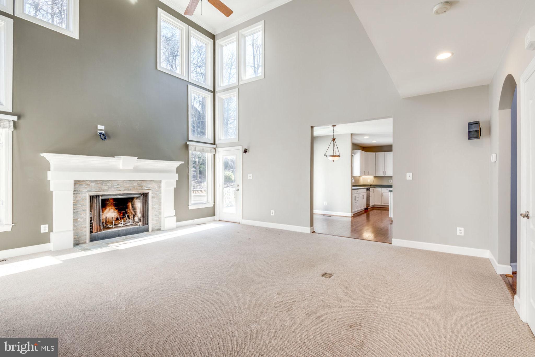 12029 Creekbend Drive Reston, VA 20194 - Photo 12 of 47 Two Story Family Room with Wood burning Fireplace