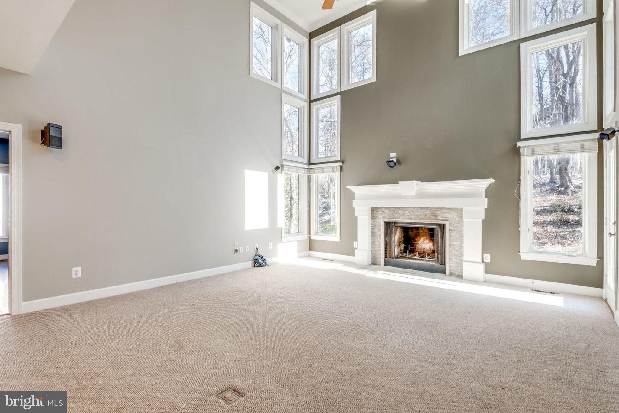 12029 Creekbend Drive Reston, VA 20194 - Photo 13 of 47 Two Story Family Room with Wood burning Fireplace