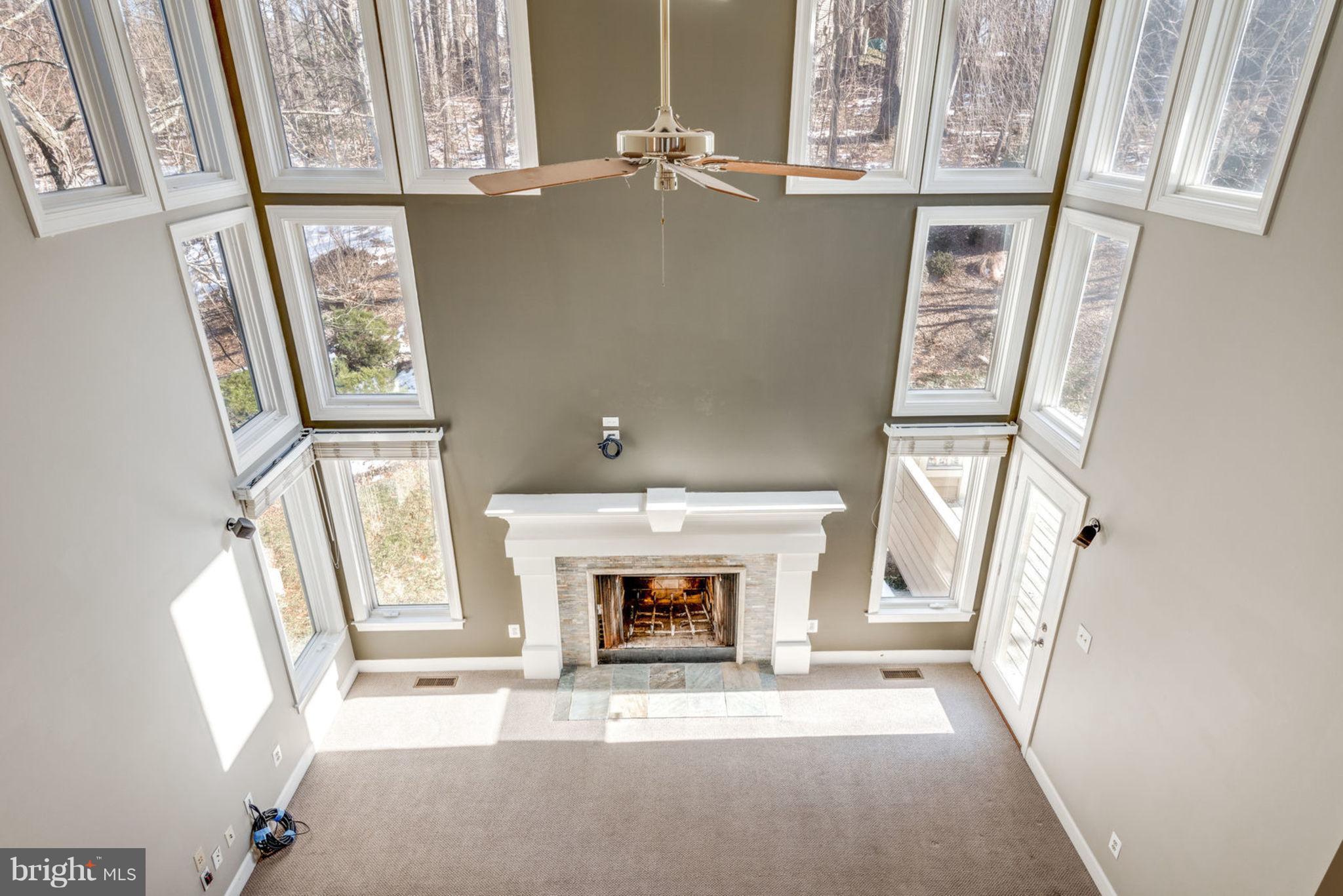12029 Creekbend Drive Reston, VA 20194 - Photo 14 of 47 Two Story Family Room with Wood burning Fireplace