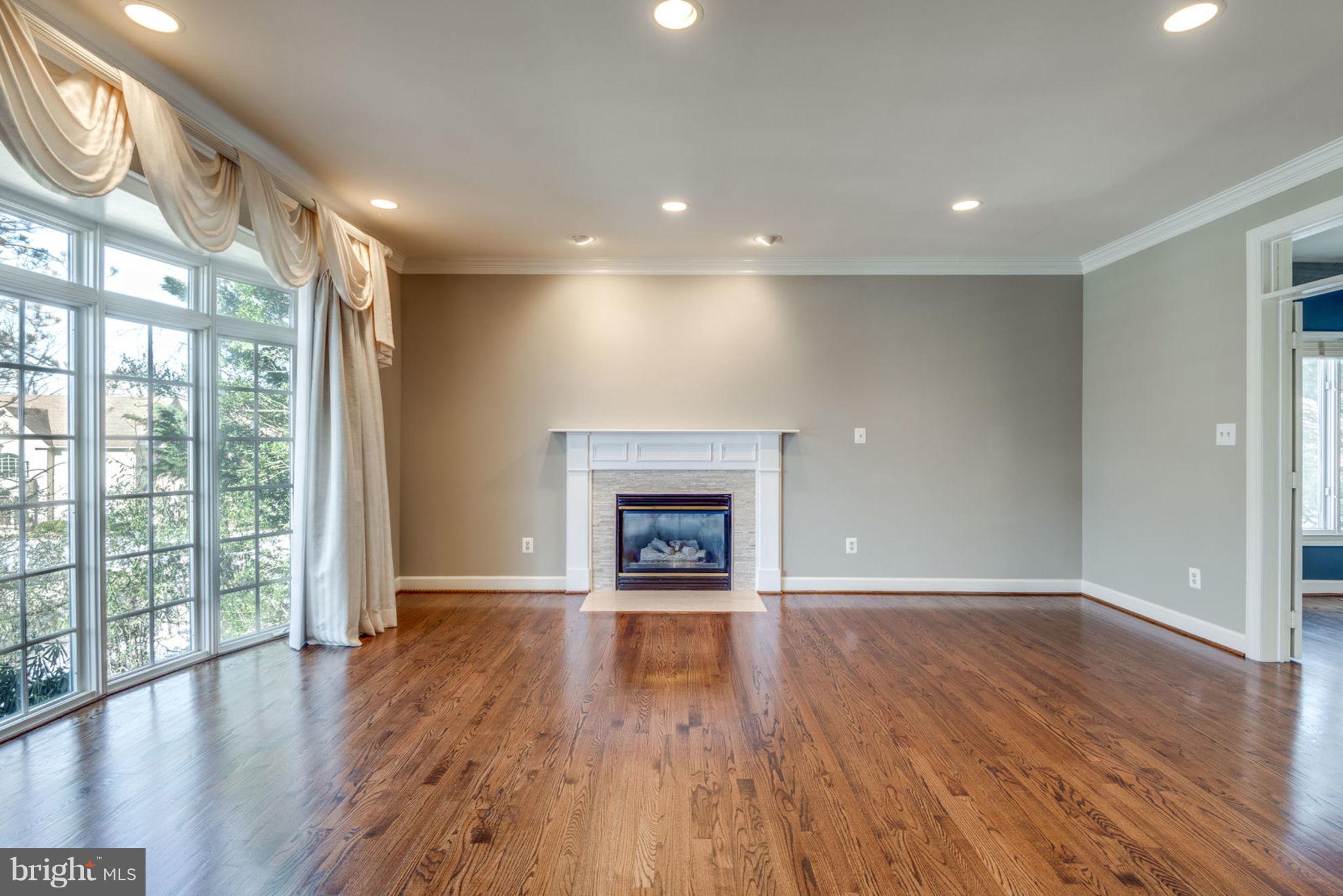 12029 Creekbend Drive Reston, VA 20194 - Photo 8 of 47 Living Room w/ Gas Fireplace
