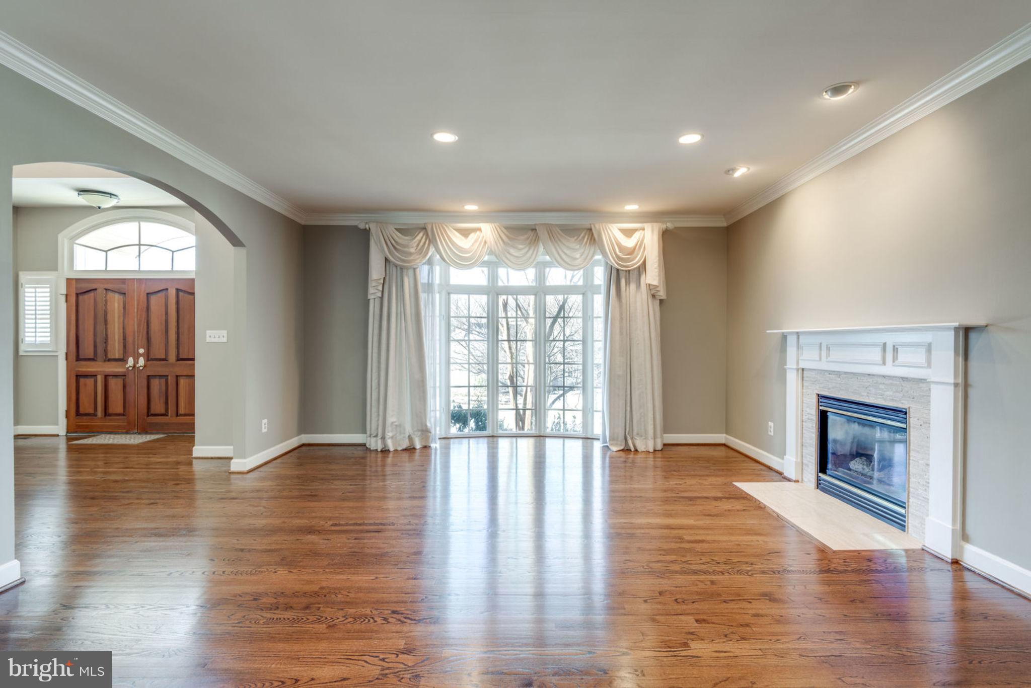 12029 Creekbend Drive Reston, VA 20194 - Photo 9 of 47 Living Room with Gas Fireplace