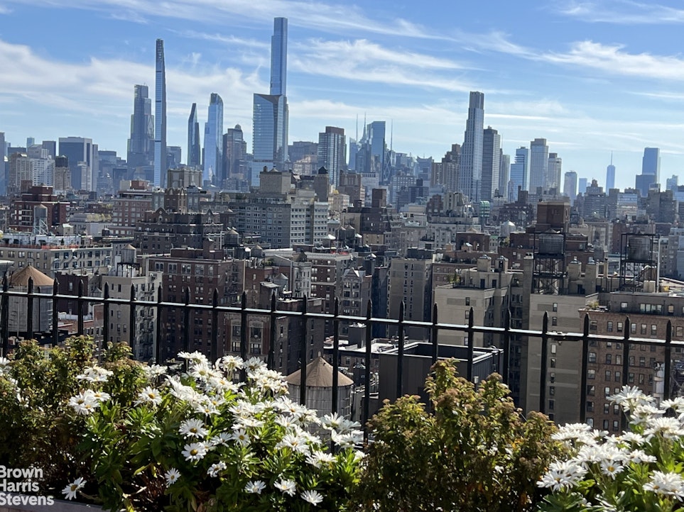 140 Riverside Drive, Unit 5K Manhattan, NY 10024 - Photo 12 of 16 a view of a city with tall buildings