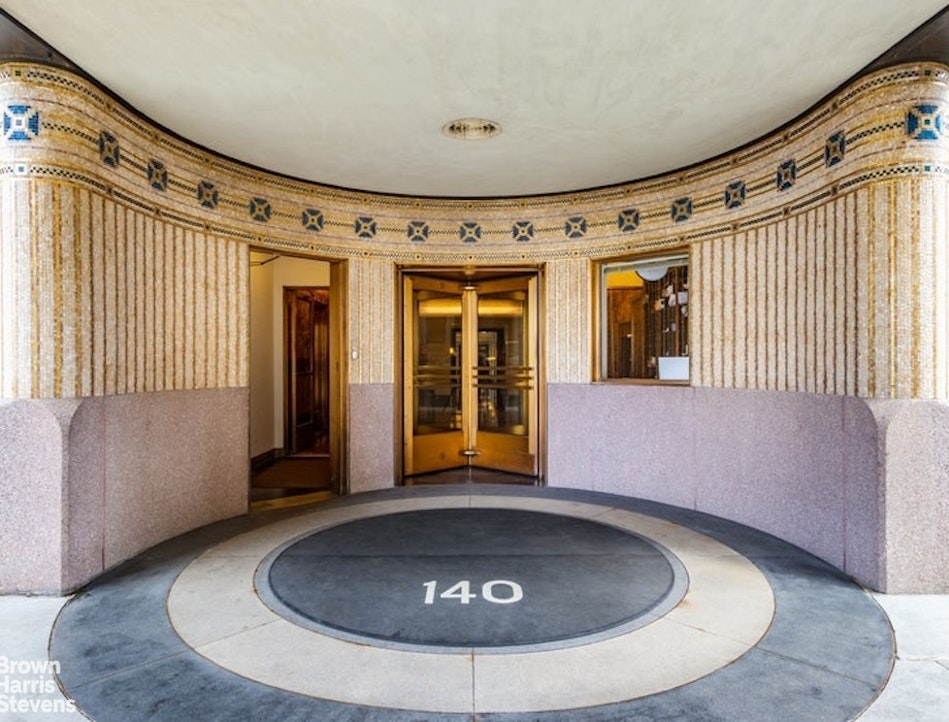 140 Riverside Drive, Unit 5K Manhattan, NY 10024 - Photo 15 of 16 a view of a porch with a table and chairs