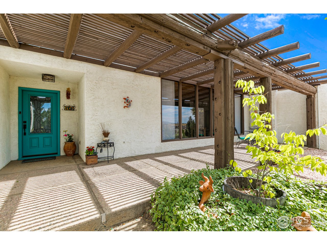 106 Bothun Road Berthoud, CO 80513 - Photo 1 of 40 Welcoming Front Porch