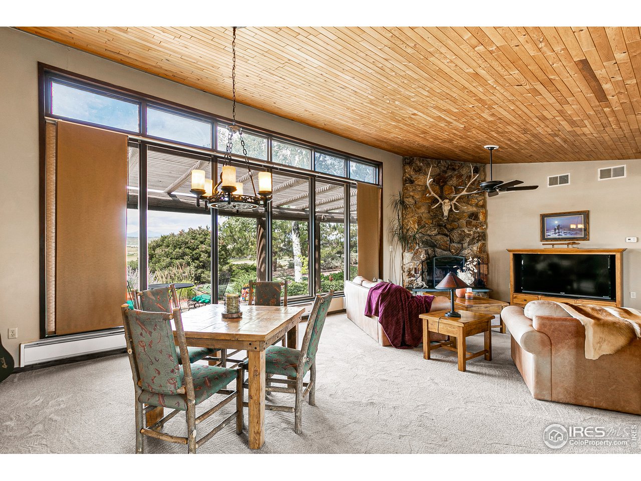 106 Bothun Road Berthoud, CO 80513 - Photo 12 of 40 Dining open to Living