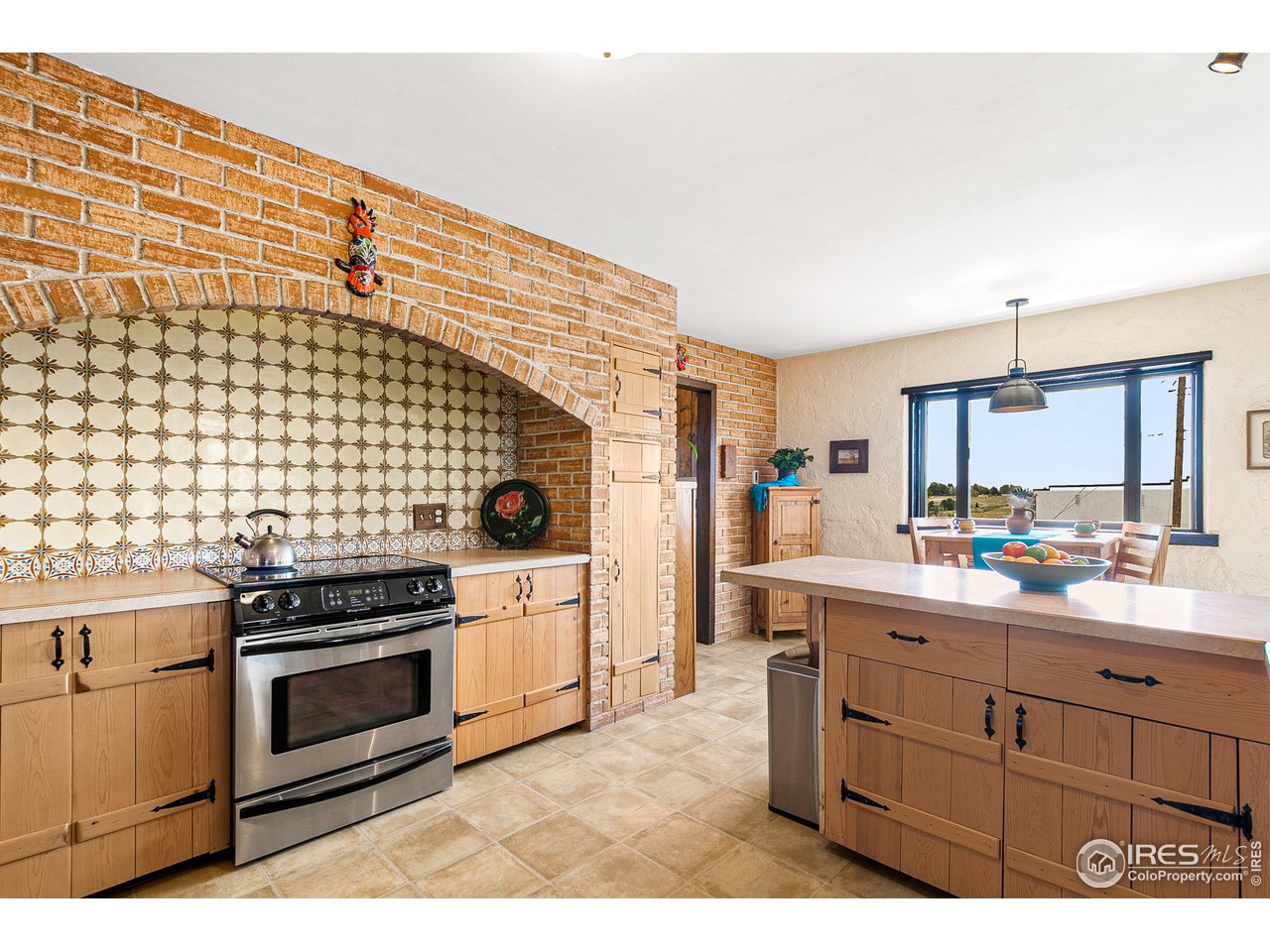 106 Bothun Road Berthoud, CO 80513 - Photo 16 of 40 Kitchen reflects Sante Fe style