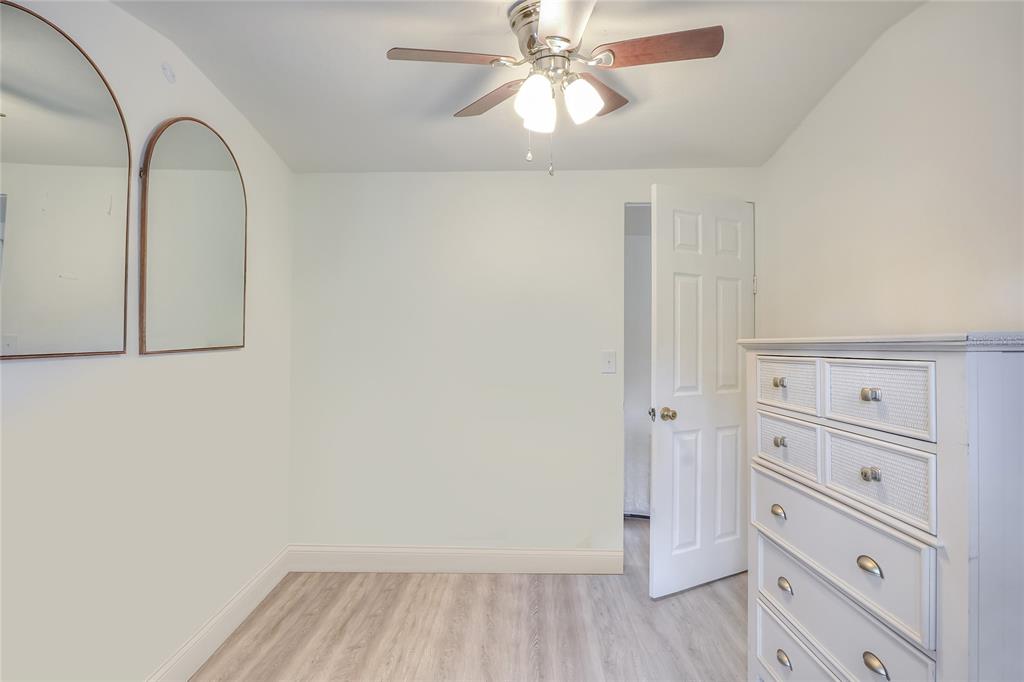 12552 Farmettes Road Lakeland, FL 33809 - Photo 17 of 43 wooden floor in an empty room