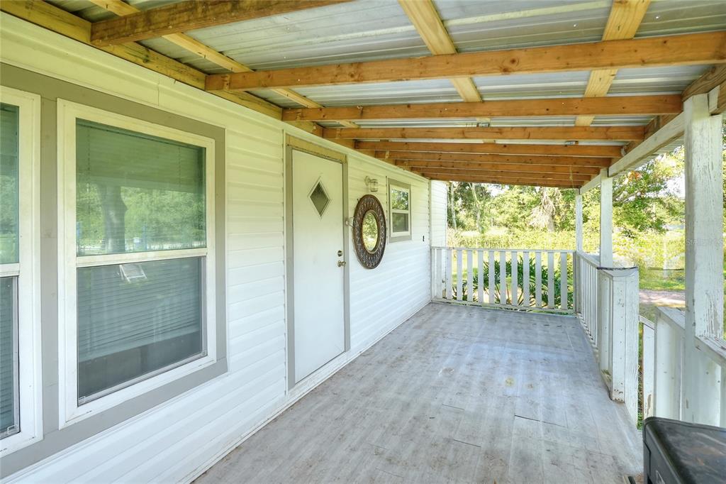 12552 Farmettes Road Lakeland, FL 33809 - Photo 22 of 43 a view of a back yard from a building