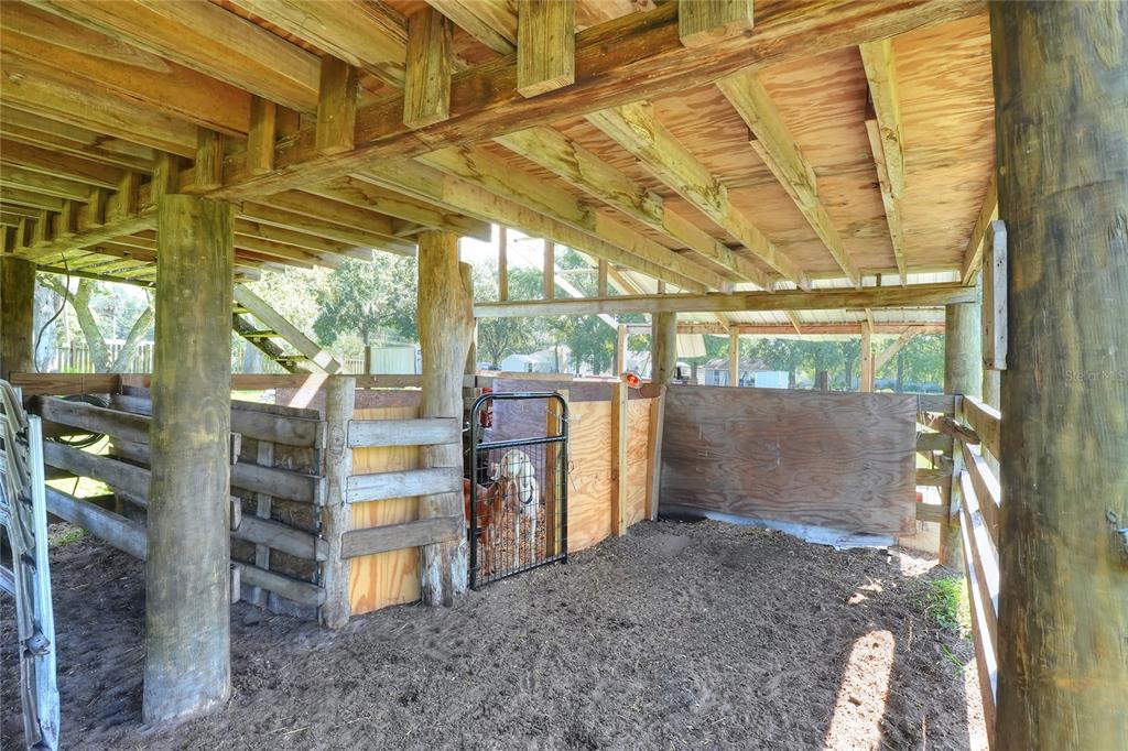 12552 Farmettes Road Lakeland, FL 33809 - Photo 26 of 43 a view of a glass door and chair