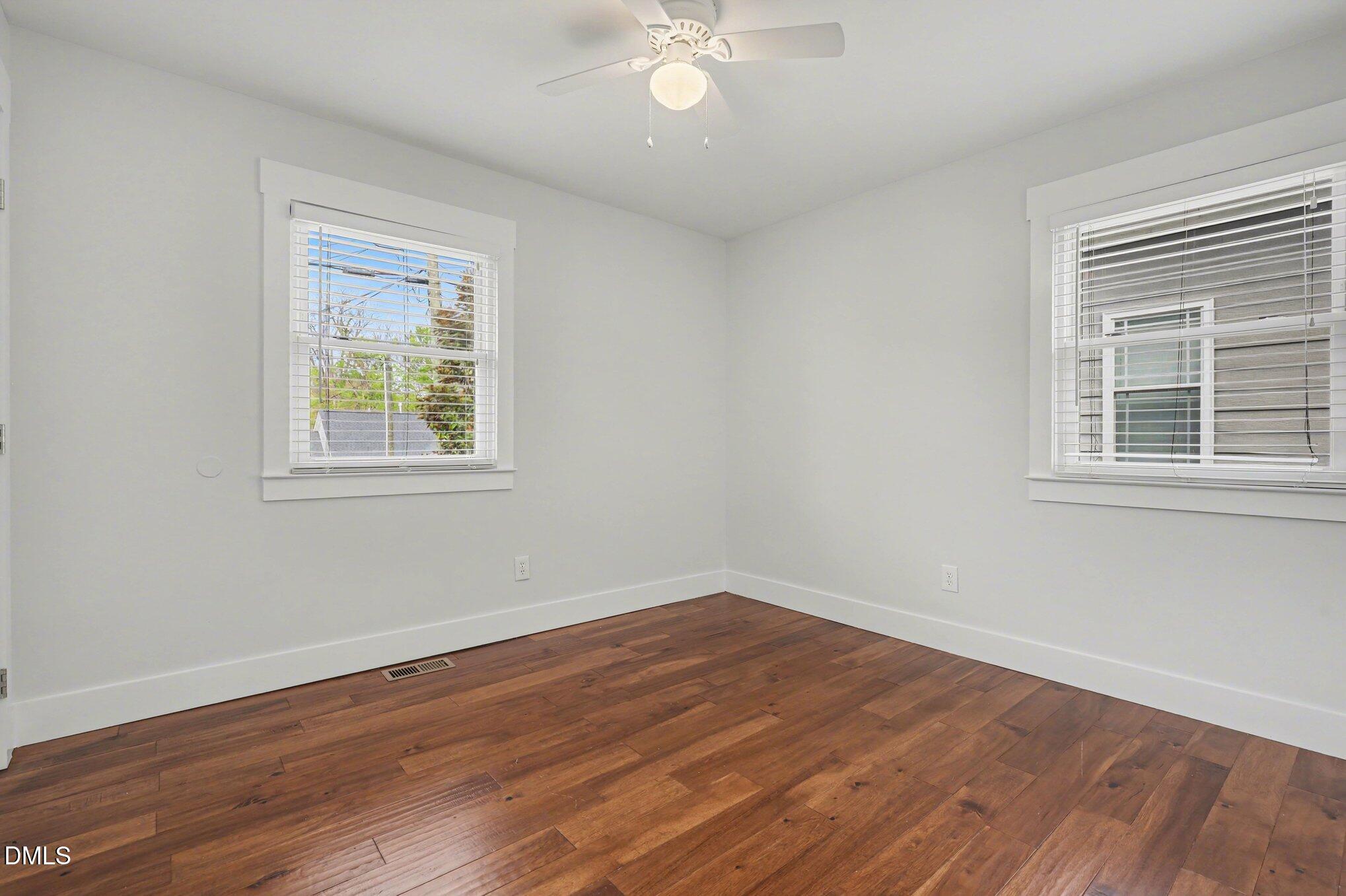 727 South State Street Raleigh, NC 27601 - Photo 18 of 30 a view of a room with wooden floor and windows
