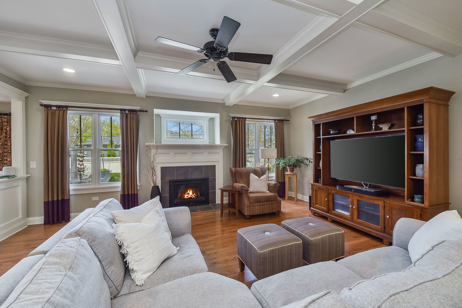 427 Ranch Road Wheaton, IL 60187 - Photo 11 of 38 a living room with furniture and a flat screen tv